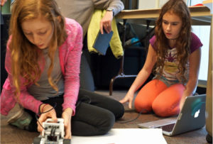 ICS students coding their Lego Mindstorm robot