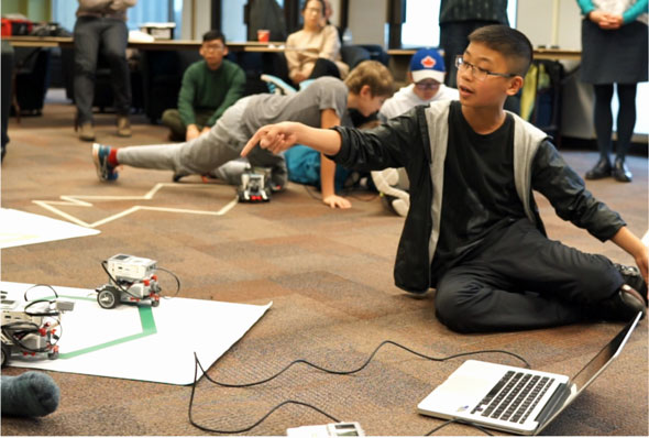 ICS student uses code to make his robot follow a track