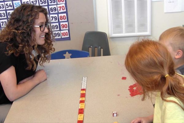 Teacher playing the number line game with her students