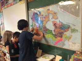 JICS students use a map of Canada to understand the ancestry of the land